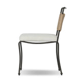 Inspired by Art Deco designs, this outdoor dining chair introduces a sense of movement to a classic silhouette. Subtly curved metal framing, a woven back and upholstered seat cushion craft a thoughtful mix of materials. Cover or store inside during inclement weather and when not in use. Amethyst Home provides interior design, new home construction design consulting, vintage area rugs, and lighting in the Tampa metro area.