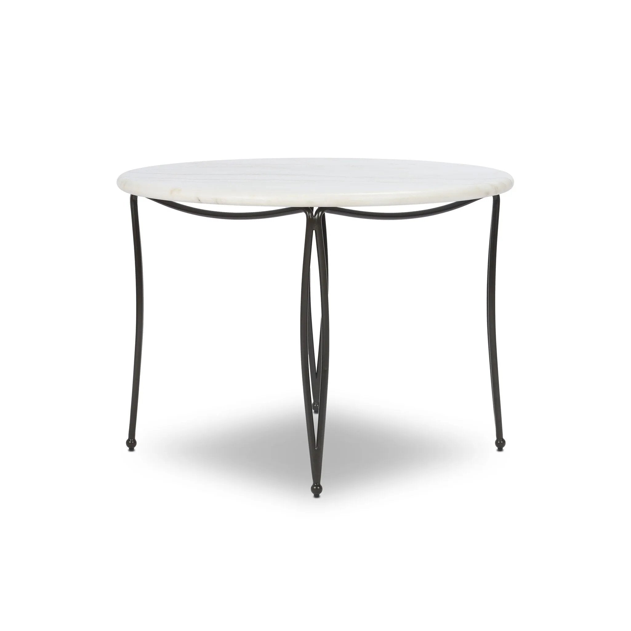Inspired by Art Deco designs, this outdoor bistro dining table introduces a sense of movement to a classic silhouette. Graceful, flowing lines on the base pair with a white marble top for a classic black-and-white look. Cover or store inside during inclement weather and when not in use. Amethyst Home provides interior design, new home construction design consulting, vintage area rugs, and lighting in the Des Moines metro area.
