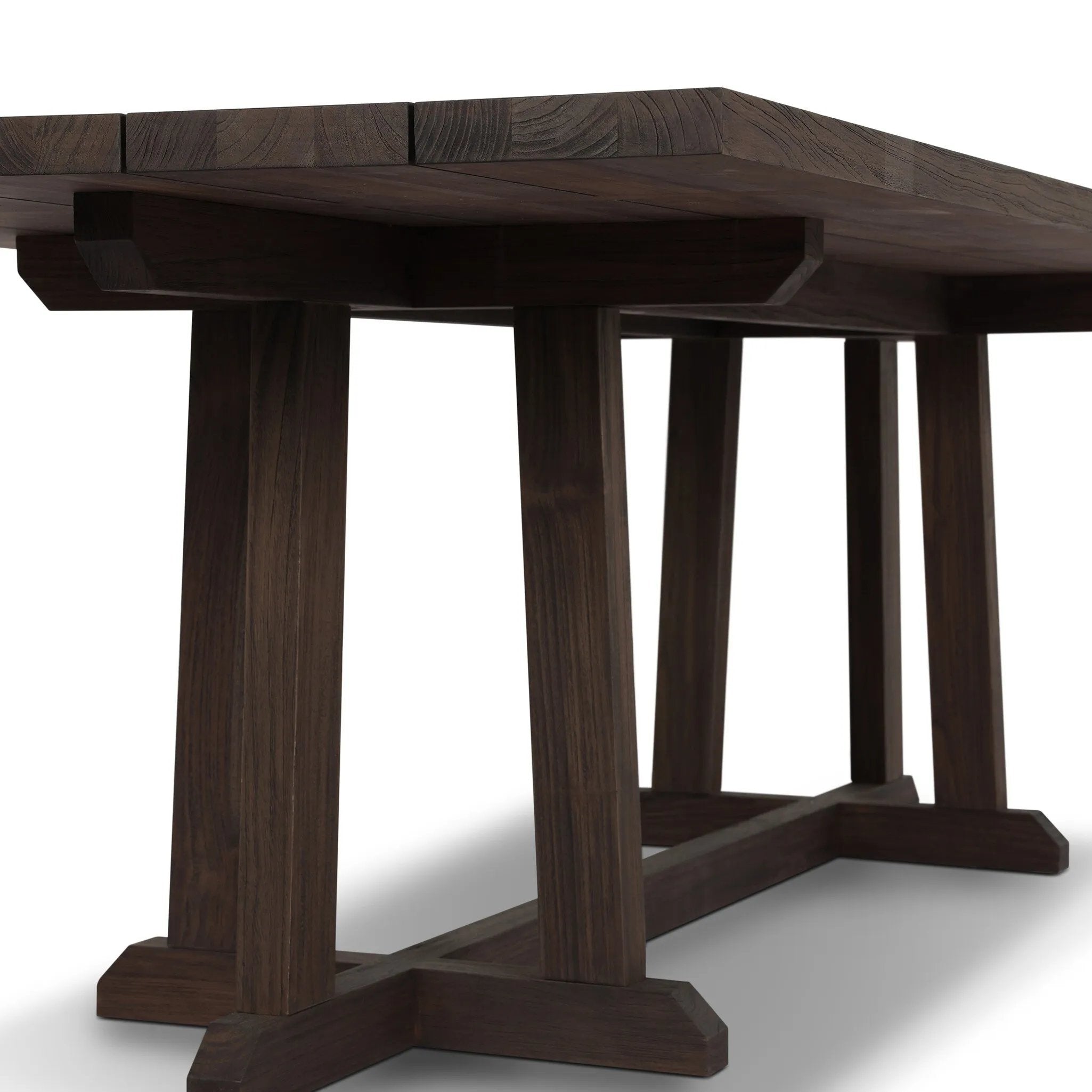 Subtly angled legs meet in a trestle-style stretcher base, pairing with a slatted top for a rustic-style outdoor dining table, also ideal for indoor spaces. Large chamfer details on the base and supports bring softness to FSC®-certified teak. Cover or store inside during inclement weather and when not in use Amethyst Home provides interior design, new home construction design consulting, vintage area rugs, and lighting in the Kansas City metro area.