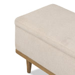 Wrapped in textural cream performance fabric, this spacious trunk doubles as seating at the foot of the bed — or anywhere. Store extra blankets, linens and more. Crafted from oak, the frame and tapered legs with Deco vibes are finished in a worn oak finish. Amethyst Home provides interior design, new home construction design consulting, vintage area rugs, and lighting in the Dallas metro area.