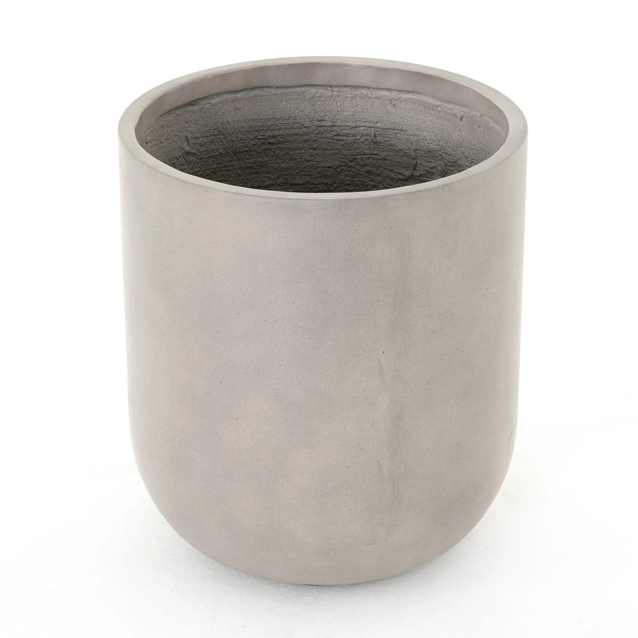 Grey-finished concrete and round shaping make for a naturally sleek planter, indoors or out. Cover or store inside during inclement weather and when not in use Amethyst Home provides interior design, new home construction design consulting, vintage area rugs, and lighting in the Portland metro area.