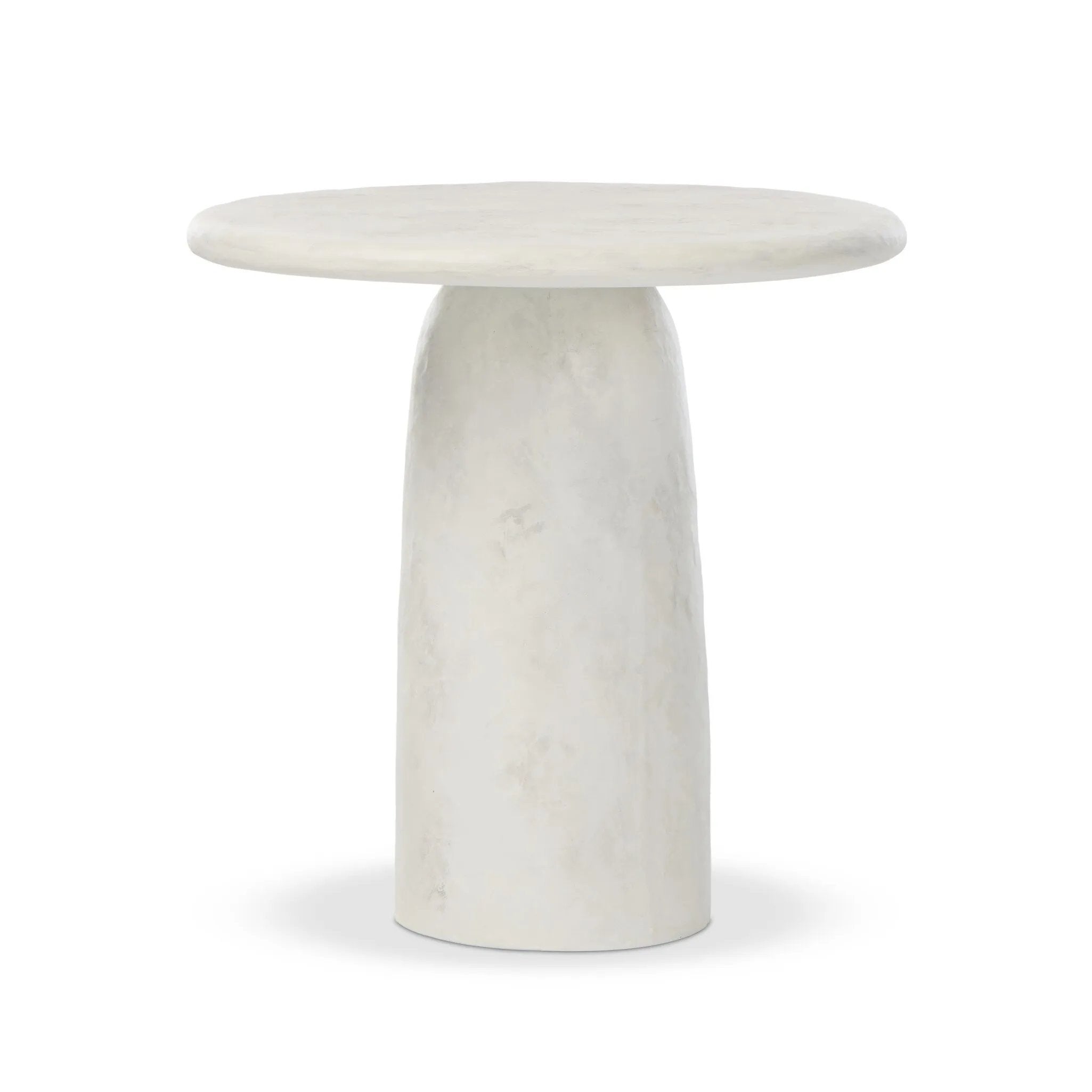 A dome-shaped pedestal base supports a rounded tabletop with bullnose edges. Made from cast white-finished concrete Amethyst Home provides interior design, new home construction design consulting, vintage area rugs, and lighting in the Seattle metro area.