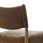 A midcentury-inspired piece brought to modern times. A supportive, sling-style back and seat cushion are upholstered in a soft, velvety fabric, with toasted oak armless framing Amethyst Home provides interior design, new home construction design consulting, vintage area rugs, and lighting in the Tampa metro area.