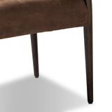 A midcentury-inspired piece brought to modern times. A supportive, sling-style back and seat cushion are upholstered in a soft, velvety fabric, with toasted oak armless framing Amethyst Home provides interior design, new home construction design consulting, vintage area rugs, and lighting in the Nashville metro area.