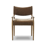 A midcentury-inspired piece brought to modern speed. A supportive, sling-style back and seat cushion are upholstered in a soft, velvety fabric, with toasted oak arms prime for the head of the table Amethyst Home provides interior design, new home construction design consulting, vintage area rugs, and lighting in the Boston metro area.