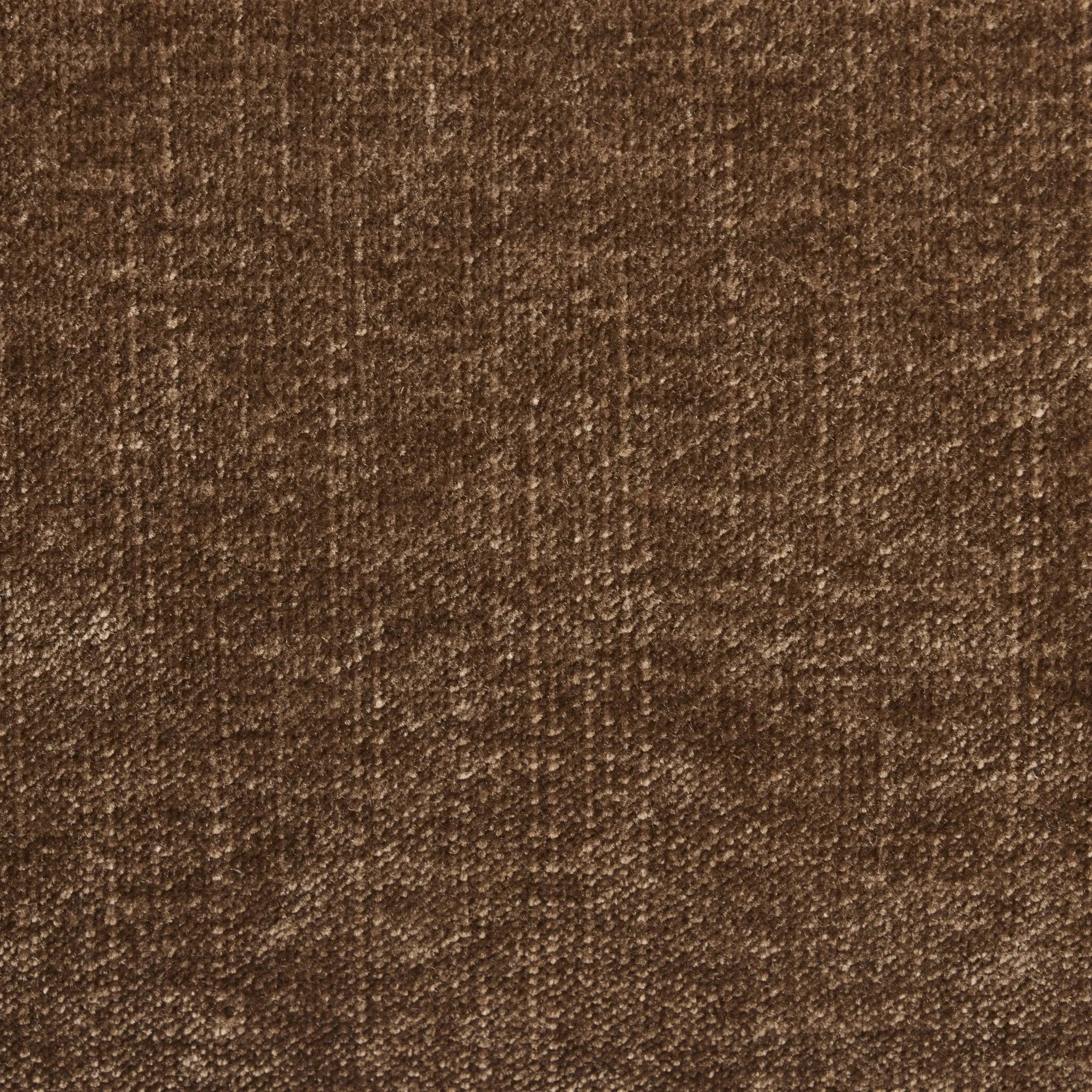 A midcentury-inspired piece brought to modern speed. A supportive, sling-style back and seat cushion are upholstered in a soft, velvety fabric, with toasted oak arms prime for the head of the table Amethyst Home provides interior design, new home construction design consulting, vintage area rugs, and lighting in the Park City metro area.