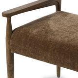 A midcentury-inspired piece brought to modern speed. A supportive, sling-style back and seat cushion are upholstered in a soft, velvety fabric, with toasted oak arms prime for the head of the table Amethyst Home provides interior design, new home construction design consulting, vintage area rugs, and lighting in the Salt Lake City metro area.