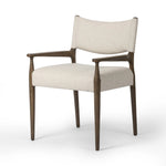 A midcentury-inspired piece, updated for modern times. A supportive back and seat cushion are upholstered in high-performance fabric, with walnut-finished wooden armrests prime for the head of the table. Steam regularly to keep fabric looking crisp. Amethyst Home provides interior design, new home construction design consulting, vintage area rugs, and lighting in the Salt Lake City metro area.