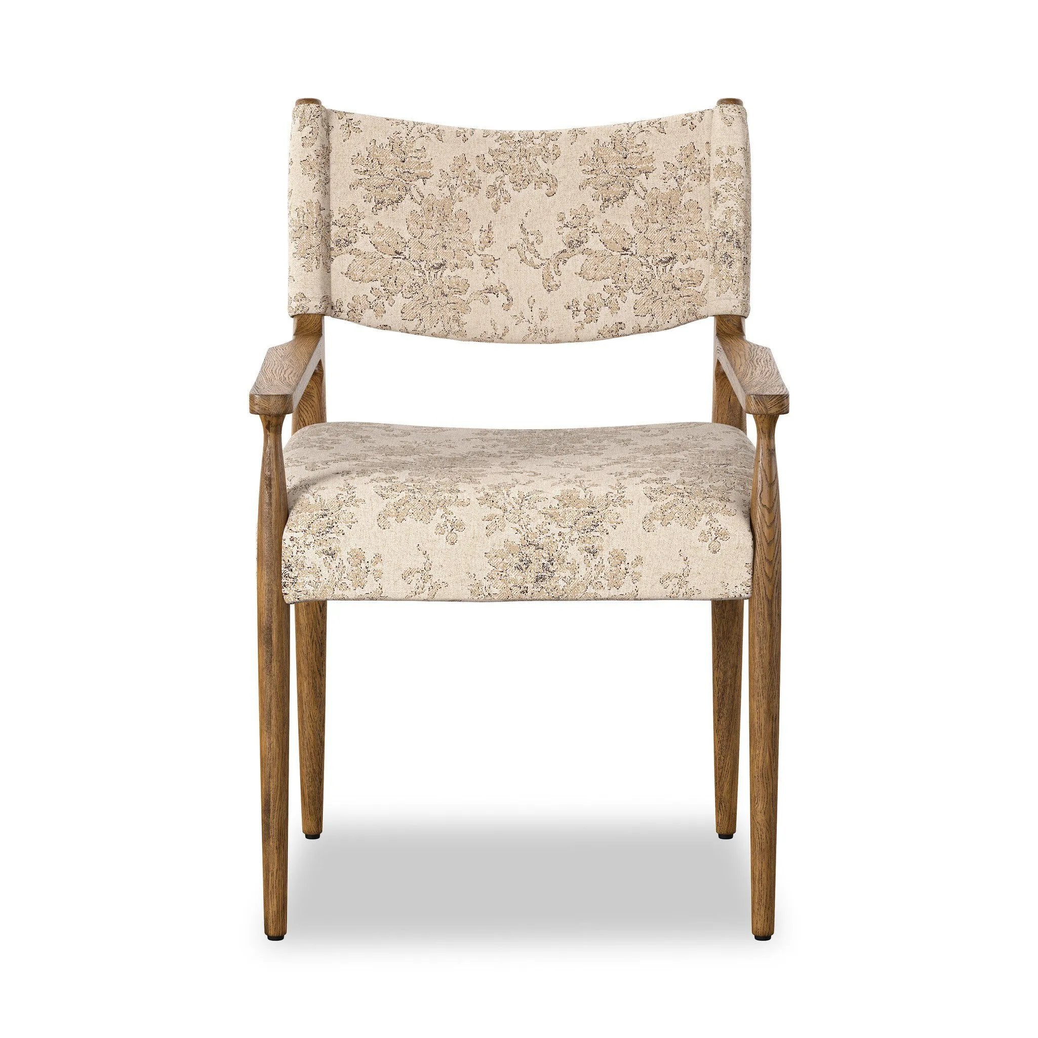 A midcentury-inspired piece brought to modern speed. A supportive, sling-style back and seat cushion are upholstered in a soft, velvety fabric, with toasted oak arms prime for the head of the table Amethyst Home provides interior design, new home construction design consulting, vintage area rugs, and lighting in the San Diego metro area.