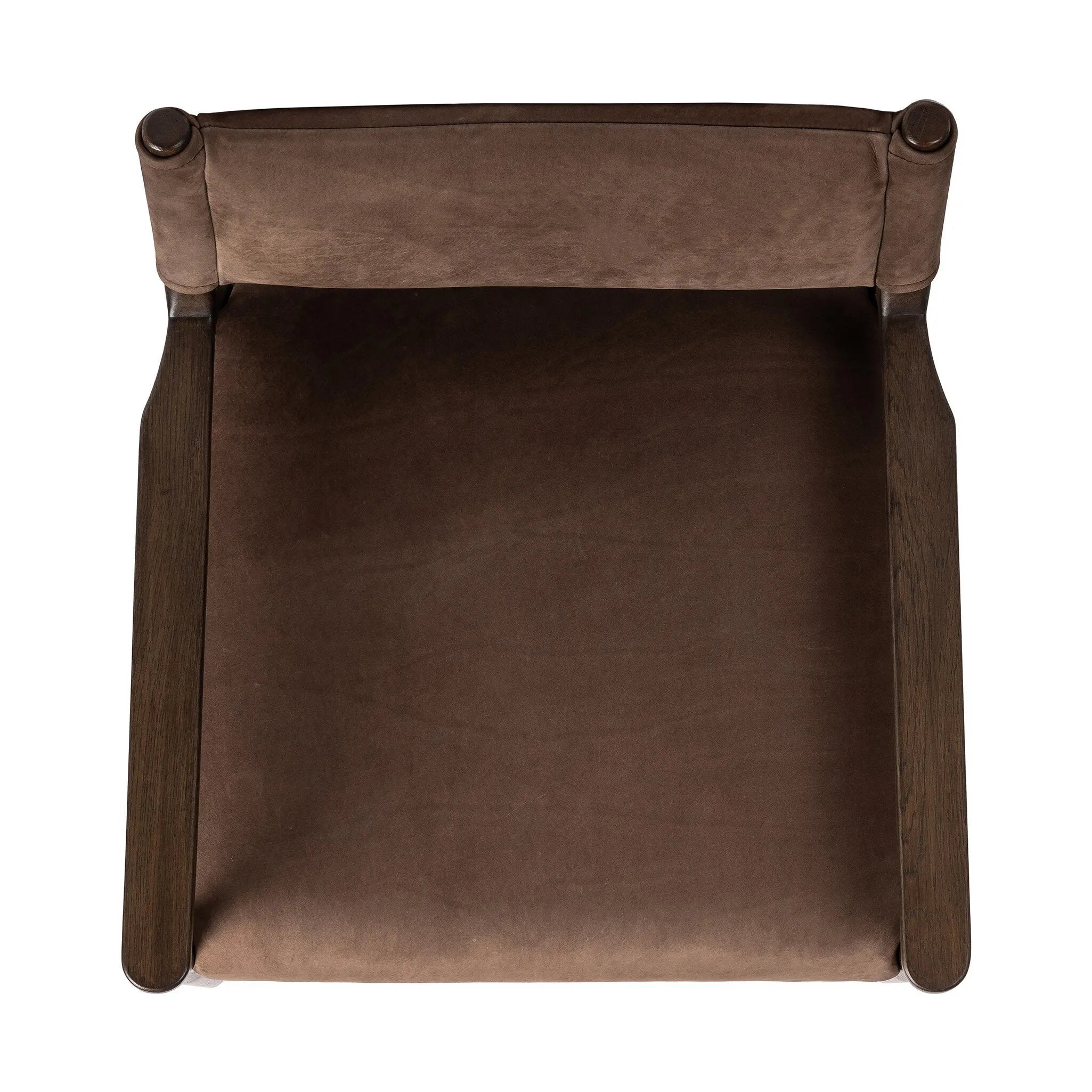 A midcentury-inspired piece brought to modern speed. A supportive, sling-style back and seat cushion are upholstered in a soft, velvety fabric, with toasted oak arms prime for the head of the table Amethyst Home provides interior design, new home construction design consulting, vintage area rugs, and lighting in the Laguna Beach metro area.