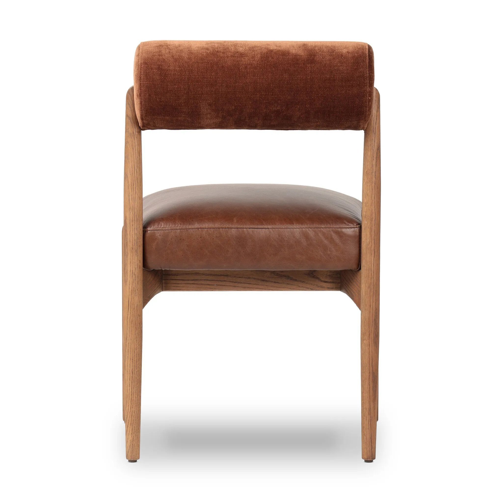 Featuring Jazelle Altair Sienna Dining Chair by Four Hands at Amethyst Home. The armless dining chair gets a playful update with a bolstered cylinder seat back. Made from top-grain leather and warm-finished oak to elevate your bar, kitchen or dining space. Overall Dimensions: 22.25"w x 25.75"d x 32.25"h. Amethyst Home provides interior design, new home construction design consulting, vintage area rugs, and lighting in the Houston metro area.