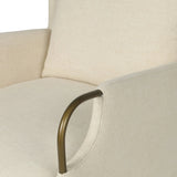 Bridging timeless tradition with modern edge, this upholstered chair strikes a one-of-a-kind silhouette. Its fixed, skirted slipcover and subtle winged back offer a classic feel, while a unique metal arm reveal  and slightly flared legs create an unparalleled look. Amethyst Home provides interior design, new home construction design consulting, vintage area rugs, and lighting in the Calabasas metro area.