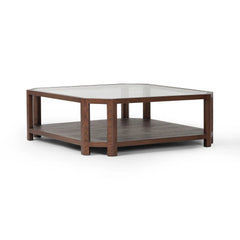 Featuring Jenzen Tempered Glass Coffee Table by Four Hands at Amethyst Home. Mix materials for a timeless look. Warm, brown oak shapes a unique octagon frame for a tempered glass top. Lower open shelving brings bonus storage and display options to your living space. Overall Dimensions: 48.00"w x 48.00"d x 16.50"h. Amethyst Home provides interior design, new home construction design consulting, vintage area rugs, and lighting in the Houston metro area.