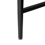 Featuring Jimi Black Cabinet by Four Hands at Amethyst Home. Storage-driven cabinetry inspired by angular geometry. Rich with monochromatic presence, a black-finished metal cabinet pairs with an airy iron base for a balance in scale. Three drawers bring even more storage, with bi-fold glass doors for display options. Minimalist bronzed hardware completes . Amethyst Home provides interior design, new home construction design consulting, vintage area rugs, and lighting in the Kansas City metro area.