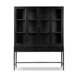 Featuring Jimi Black Cabinet by Four Hands at Amethyst Home. Storage-driven cabinetry inspired by angular geometry. Rich with monochromatic presence, a black-finished metal cabinet pairs with an airy iron base for a balance in scale. Three drawers bring even more storage, with bi-fold glass doors for display options. Minimalist bronzed hardware completes the. Amethyst Home provides interior design, new home construction design consulting, vintage area rugs, and lighting in the Portland metro area.