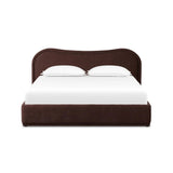 Subtly curved, this swooping bed frame is fully upholstered in a soft, plum-hue fabric for an inviting look that's rich in comfort Amethyst Home provides interior design, new home construction design consulting, vintage area rugs, and lighting in the Dallas metro area.