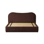 Subtly curved, this swooping bed frame is fully upholstered in a soft, plum-hue fabric for an inviting look that's rich in comfort Amethyst Home provides interior design, new home construction design consulting, vintage area rugs, and lighting in the Nashville metro area.