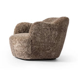 Featuring Julius Taupe Shearling Swivel Chair by Four Hands at Amethyst Home. With a supple pile that's soft to the touch, taupe shearling upholstery pairs with an S-spring seat and enveloped frame for an inviting look and feel on this 360-degree swivel chair.Overall Dimensions: 35.00"w x 36.00"d x 29.50"hWeight : 63.93 lbsMaterials: Shearling, Solid Para. Amethyst Home provides interior design, new home construction design consulting, vintage area rugs, and lighting in the Los Angeles metro area.