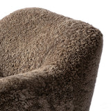 Featuring Julius Taupe Shearling Swivel Chair by Four Hands at Amethyst Home. With a supple pile that's soft to the touch, taupe shearling upholstery pairs with an S-spring seat and enveloped frame for an inviting look and feel on this 360-degree swivel chair.Overall Dimensions: 35.00"w x 36.00"d x 29.50"hWeight : 63.93 lbsMaterials: Shearling, Solid Parawood, . Amethyst Home provides interior design, new home construction design consulting, vintage area rugs, and lighting in the Omaha metro area.