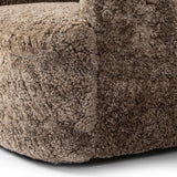 Featuring Julius Taupe Shearling Swivel Chair by Four Hands at Amethyst Home. With a supple pile that's soft to the touch, taupe shearling upholstery pairs with an S-spring seat and enveloped frame for an inviting look and feel on this 360-degree swivel chair.Overall Dimensions: 35.00"w x 36.00"d x 29.50"hWeight : 63.93 lbsMaterials: Shearling, Solid Paraw. Amethyst Home provides interior design, new home construction design consulting, vintage area rugs, and lighting in the Scottsdale metro area.