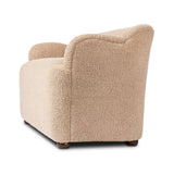 Simply classic. A high wing back pairs with softly rolled arms for a curvy look and supportive sit. Tan shearling-like upholstery invites you to settle in.As fans of natural style at Amethyst, we love the warm modern inspired Kadon Accent Bench - Sheepskin Camel. Amethyst Home provides interior design, new home construction design consulting, vintage area rugs, and lighting in the Calabasas metro area.
