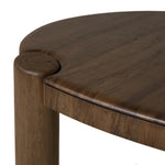 Perception play at work. A unique three-leg design shapes an organic, intentionally imperfect silhouette with a handmade look and feel. Legs of solid melina wood feature primitive design detailing while the desktop, made of spalted primavera, flaunts natural knots and graining. Together, that pairing of woods creates an intriguing visual contrast. Amethyst Home provides interior design, new home construction design consulting, vintage area rugs, and lighting in the Austin metro area.