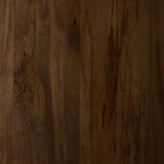 Perception play at work. A unique three-leg design shapes an organic, intentionally imperfect silhouette with a handmade look and feel. Legs of solid melina wood feature primitive design detailing while the desktop, made of spalted primavera, flaunts natural knots and graining. Together, that pairing of woods creates an intriguing visual contrast. Amethyst Home provides interior design, new home construction design consulting, vintage area rugs, and lighting in the Boston metro area.