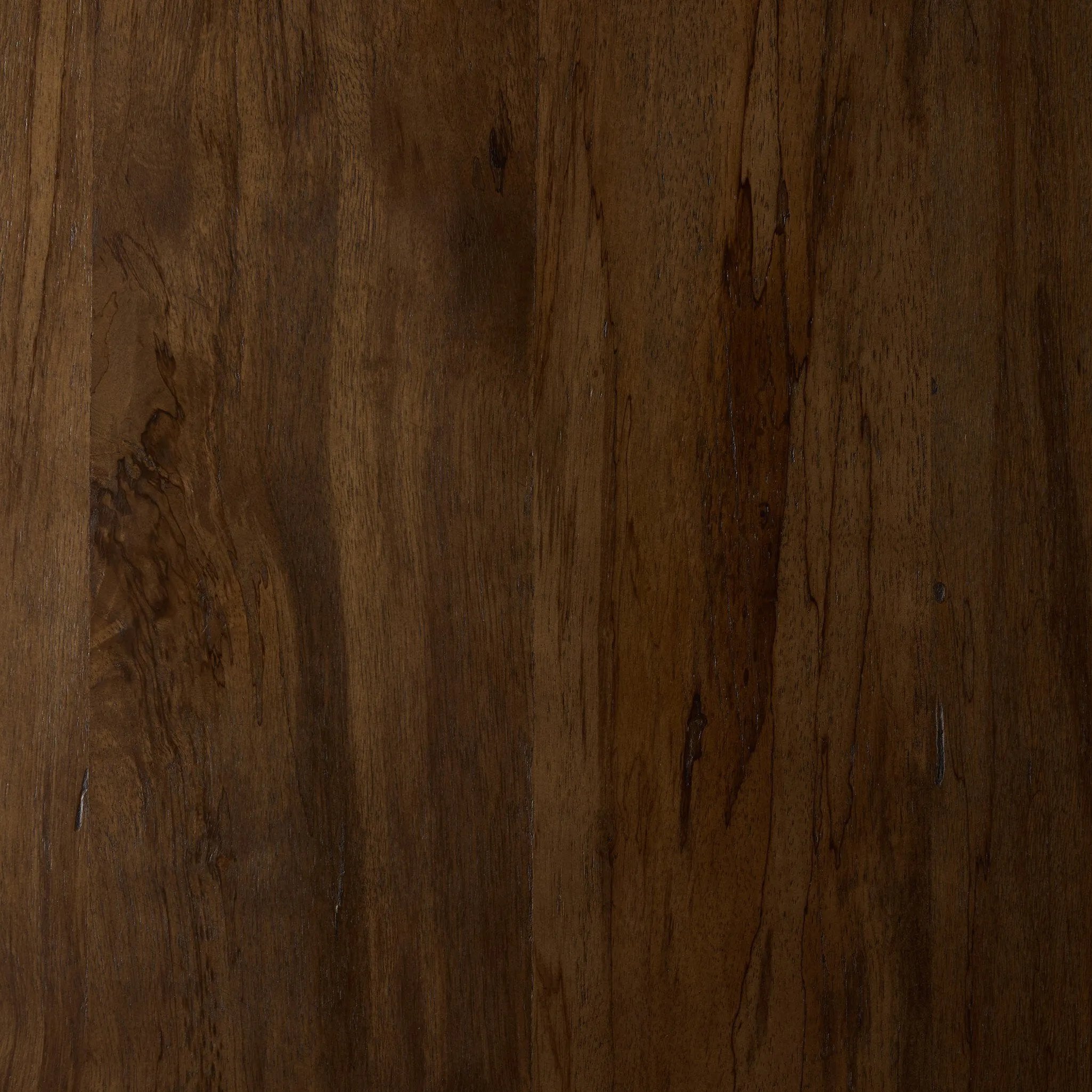 Perception play at work. A unique three-leg design shapes an organic, intentionally imperfect silhouette with a handmade look and feel. Legs of solid melina wood feature primitive design detailing while the desktop, made of spalted primavera, flaunts natural knots and graining. Together, that pairing of woods creates an intriguing visual contrast. Amethyst Home provides interior design, new home construction design consulting, vintage area rugs, and lighting in the Boston metro area.