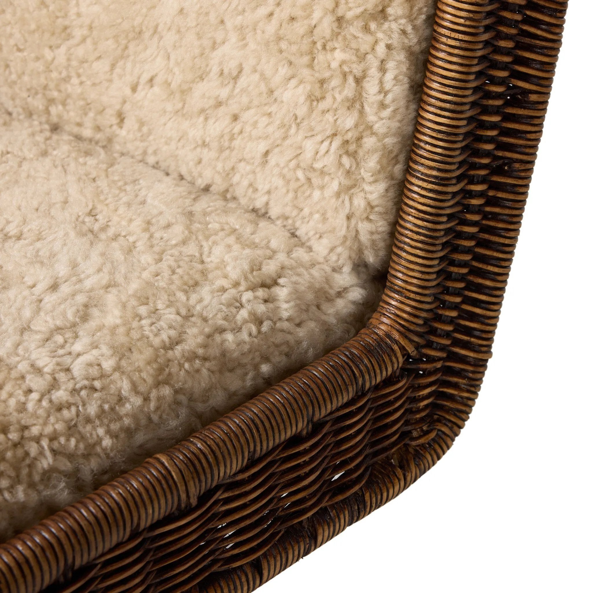 Contours and cantilevers define this Seventies-inspired dining chair. A woven sculptural frame of natural rattan bolsters textural shearling cushions for max comfort.As fans of wabi sabi materials at Amethyst, we love the warm modern inspired Katrine Dining Chair - Beige Shorn Shearling. Amethyst Home provides interior design, new home construction design consulting, vintage area rugs, and lighting in the Calabasas metro area.