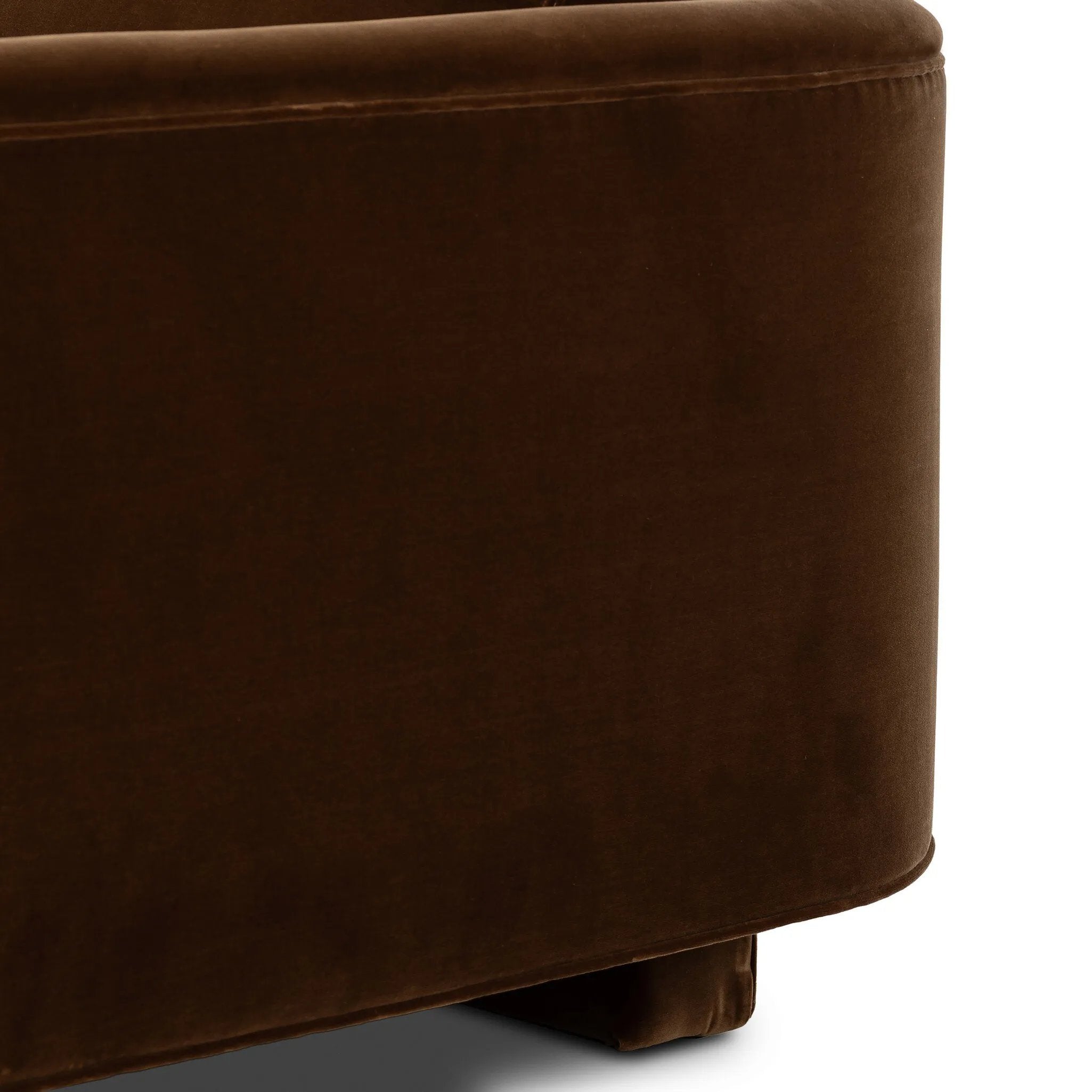 Float-style this unique sofa in a room to show off design details like sleek lines and rear cutouts. Designed with S spring construction, foam and fiber seat cushioning and loose feather-blend back cushions. Upholstered in a soft, velvety cotton in a rich chocolate brown Amethyst Home provides interior design, new home construction design consulting, vintage area rugs, and lighting in the Miami metro area.