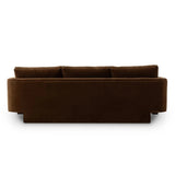 Float-style this unique sofa in a room to show off design details like sleek lines and rear cutouts. Designed with S spring construction, foam and fiber seat cushioning and loose feather-blend back cushions. Upholstered in a soft, velvety cotton in a rich chocolate brown Amethyst Home provides interior design, new home construction design consulting, vintage area rugs, and lighting in the Newport Beach metro area.