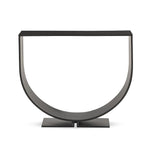 Simply structured and architectural, this outdoor firewood holder is constructed of an inverted arch of charcoal iron atop a minimalist split base foot. Cover or store indoors during inclement weather and when not in use Amethyst Home provides interior design, new home construction design consulting, vintage area rugs, and lighting in the Des Moines metro area.