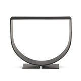 Simply structured and architectural, this outdoor firewood holder is constructed of an inverted arch of charcoal iron atop a minimalist split base foot. Cover or store indoors during inclement weather and when not in use Amethyst Home provides interior design, new home construction design consulting, vintage area rugs, and lighting in the Des Moines metro area.