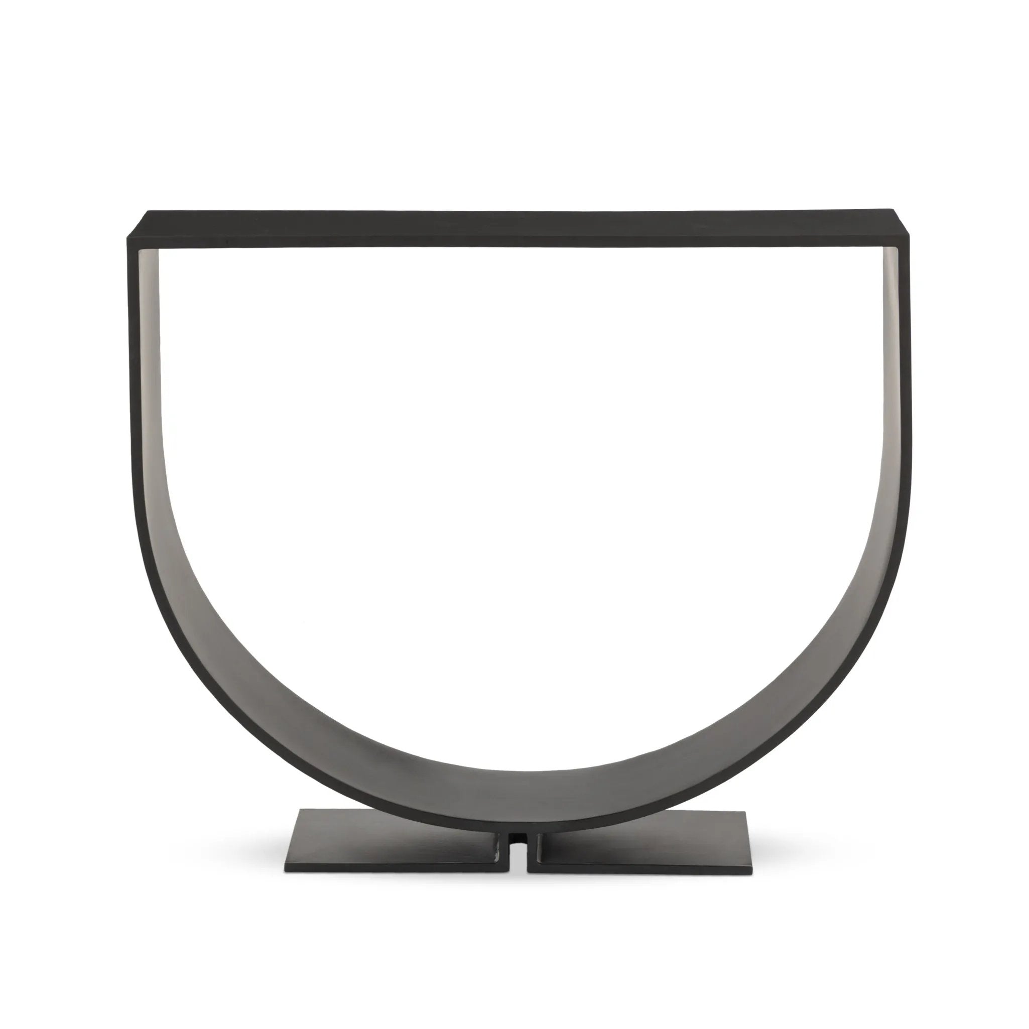 Simply structured and architectural, this outdoor firewood holder is constructed of an inverted arch of charcoal iron atop a minimalist split base foot. Cover or store indoors during inclement weather and when not in use Amethyst Home provides interior design, new home construction design consulting, vintage area rugs, and lighting in the Des Moines metro area.