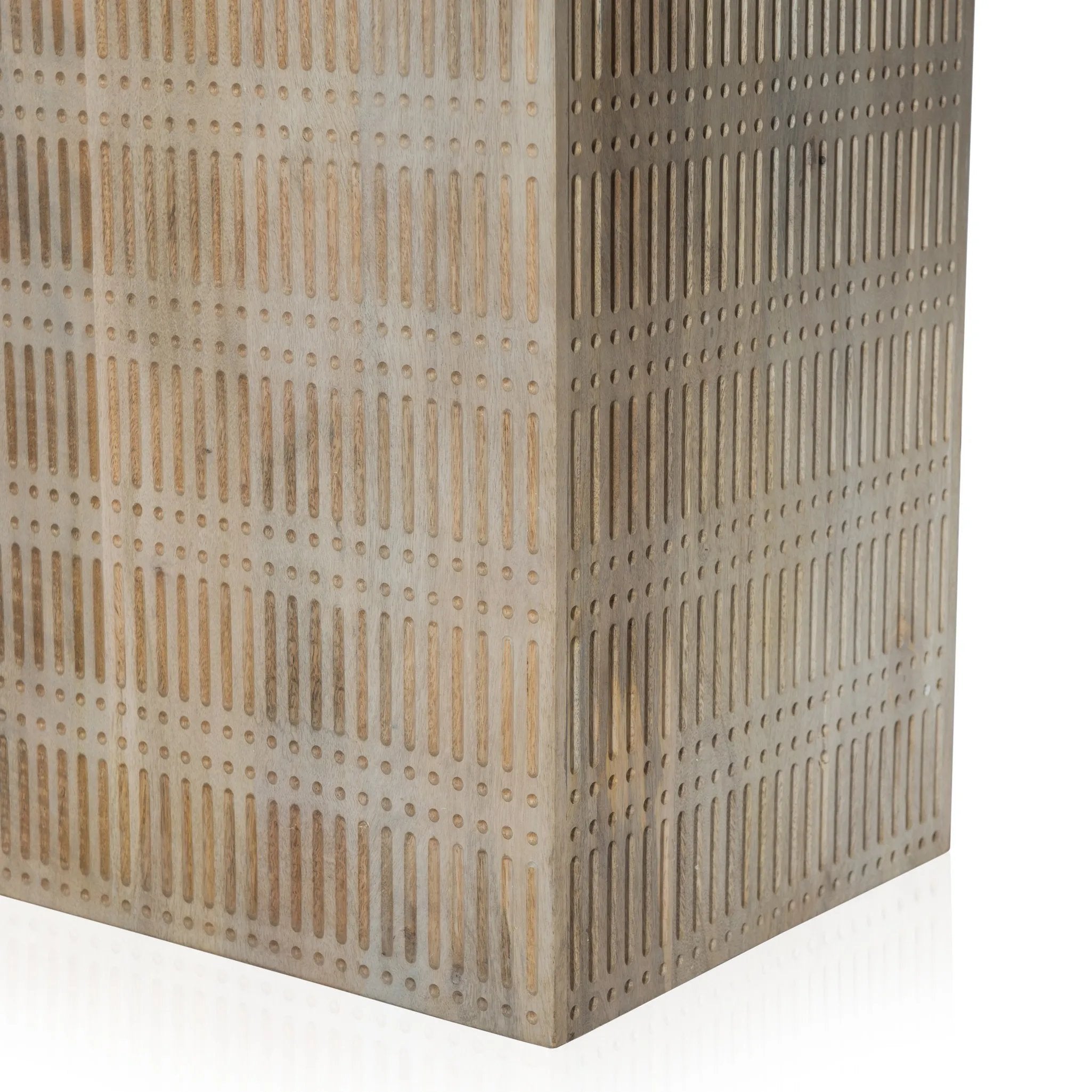 Unique linear carving with an artisan slant. Mango wood is finished in a light wash, highlighting texture and craftsmanship alike. Seats eight comfortably Amethyst Home provides interior design, new home construction design consulting, vintage area rugs, and lighting in the Houston metro area.