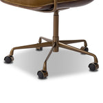 Our mixed material take on the midcentury molded ply chair. Plush ochre velvet seating pairs with a wooden back of rich brown burl and burnished brass arms that wrap under the seat and behind the back, for a continuous, flowing feel. This design-forward material mix creates a tonal and textural contrast that feels both found and fresh. Amethyst Home provides interior design, new home construction design consulting, vintage area rugs, and lighting in the Seattle metro area.