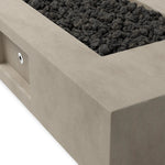 This outdoor fire table is a welcoming centerpiece designed for gathering. Made from glass-reinforced concrete, each piece is naturally finished with deep tones of pewter and dark grey. The monolithic shape is completed with lavastones in the center, bringing together a bold, monochromatic look. Amethyst Home provides interior design, new home construction design consulting, vintage area rugs, and lighting in the Monterey metro area.