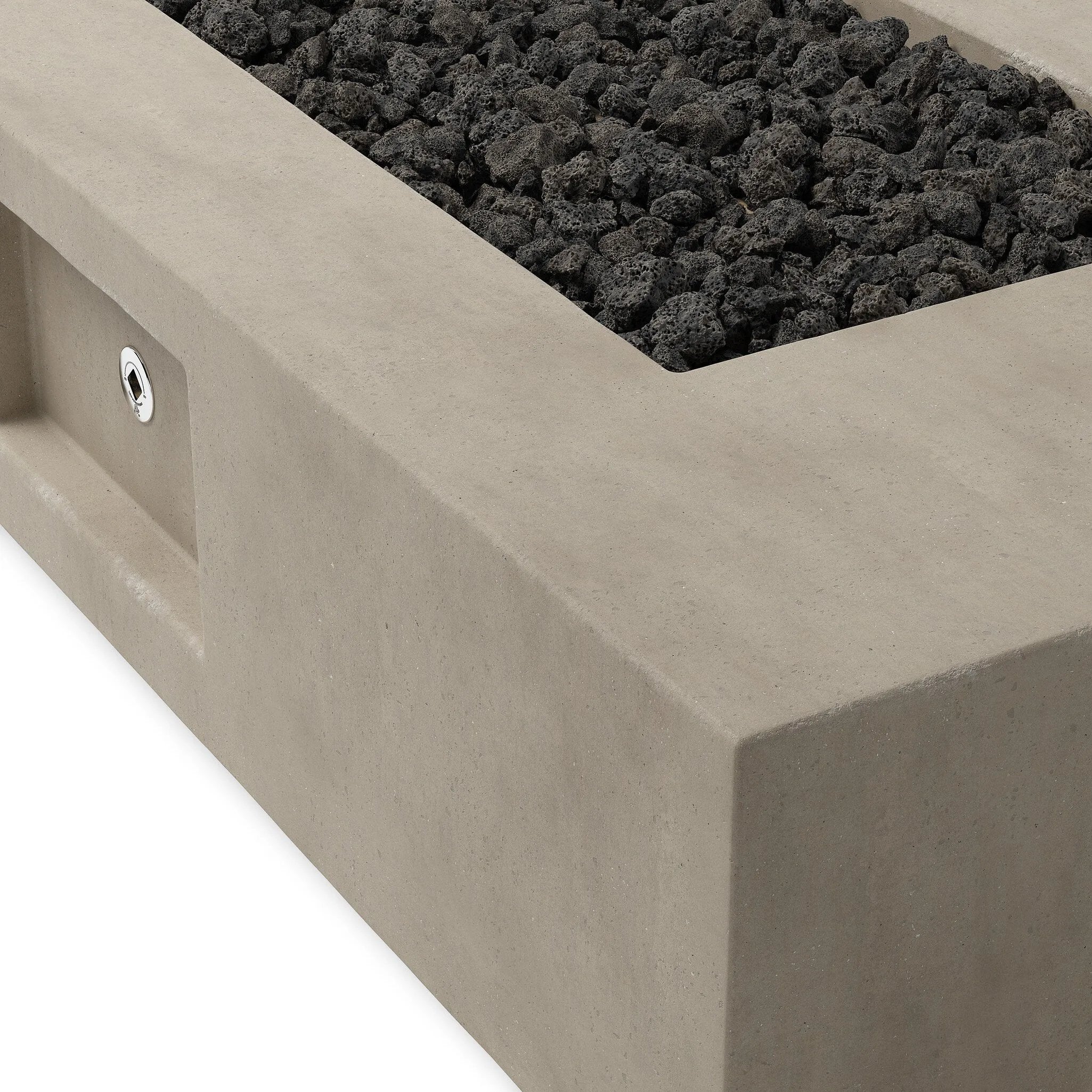 This outdoor fire table is a welcoming centerpiece designed for gathering. Made from glass-reinforced concrete, each piece is naturally finished with deep tones of pewter and dark grey. The monolithic shape is completed with lavastones in the center, bringing together a bold, monochromatic look. Amethyst Home provides interior design, new home construction design consulting, vintage area rugs, and lighting in the Monterey metro area.