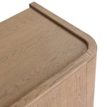 Featuring Kiran Sandy Oak Veneer Nightstand by Four Hands at Amethyst Home. Bring storage to your bedside with a monochromatic nightstand of sandy oak and painted linen, with split-circle iron hardware. A spacious interior features removable shelving to custom suit your needs. Overall Dimensions: 30.00"w x 20.00"d x 25.00"h. Amethyst Home provides interior design, new home construction design consulting, vintage area rugs, and lighting in the Des Moines metro area.