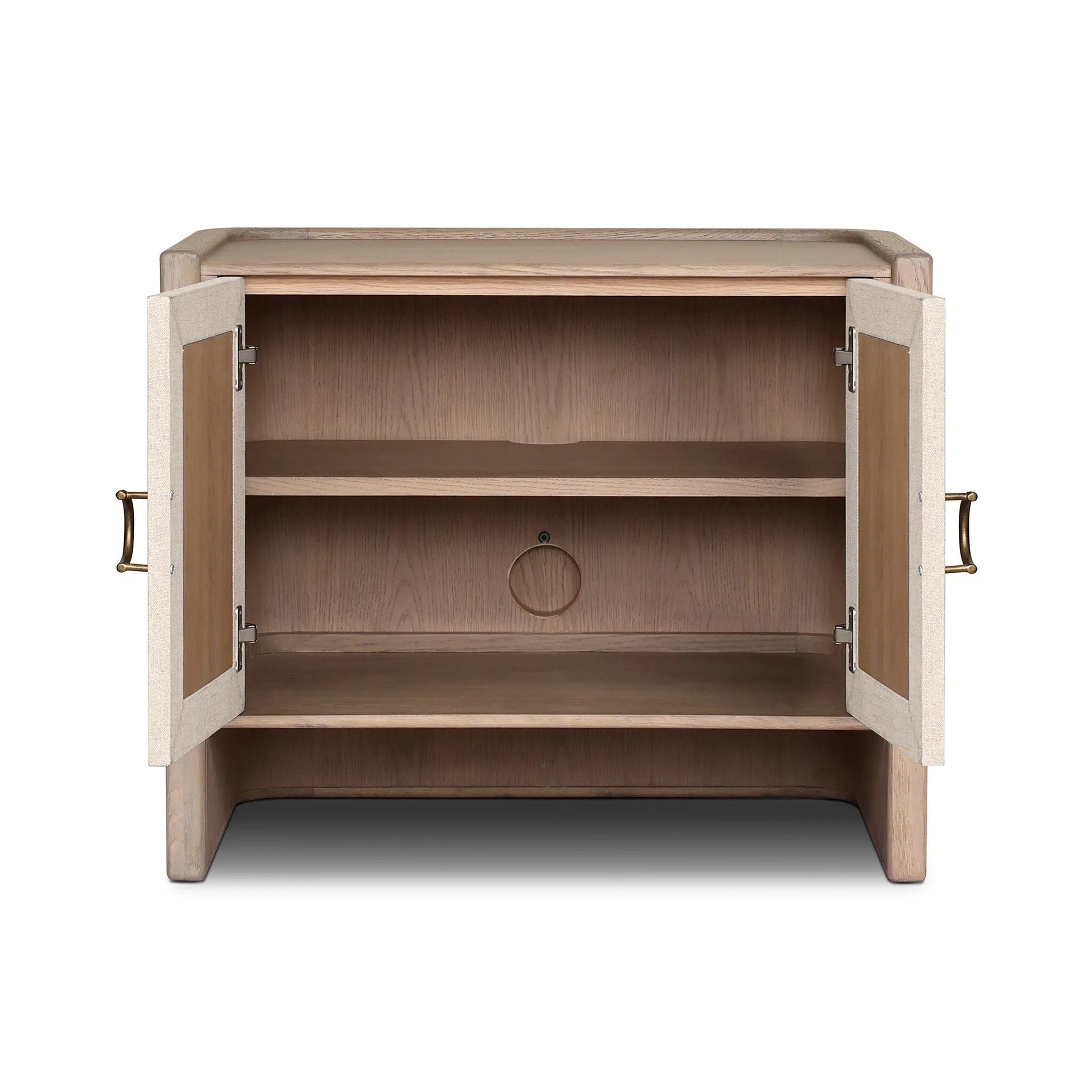 Featuring Kiran Sandy Oak Veneer Nightstand by Four Hands at Amethyst Home. Bring storage to your bedside with a monochromatic nightstand of sandy oak and painted linen, with split-circle iron hardware. A spacious interior features removable shelving to custom suit your needs. Overall Dimensions: 30.00"w x 20.00"d x 25.00"h. Amethyst Home provides interior design, new home construction design consulting, vintage area rugs, and lighting in the Nashville metro area.