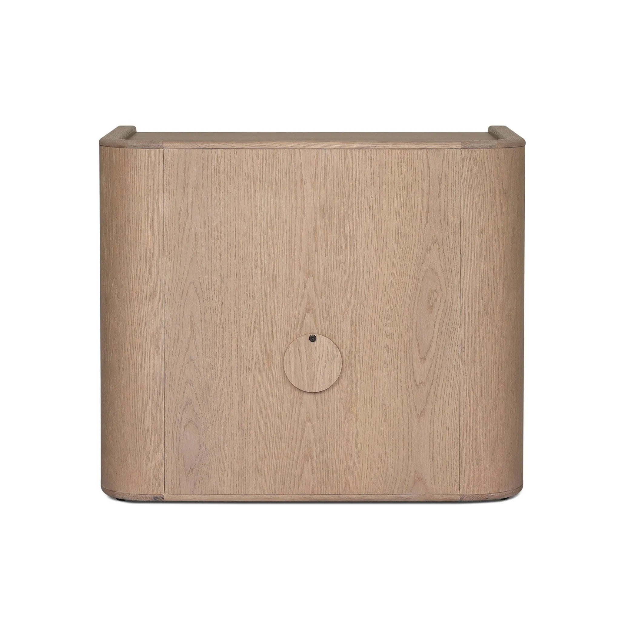 Featuring Kiran Sandy Oak Veneer Nightstand by Four Hands at Amethyst Home. Bring storage to your bedside with a monochromatic nightstand of sandy oak and painted linen, with split-circle iron hardware. A spacious interior features removable shelving to custom suit your needs. Overall Dimensions: 30.00"w x 20.00"d x 25.00"h. Amethyst Home provides interior design, new home construction design consulting, vintage area rugs, and lighting in the Seattle metro area.