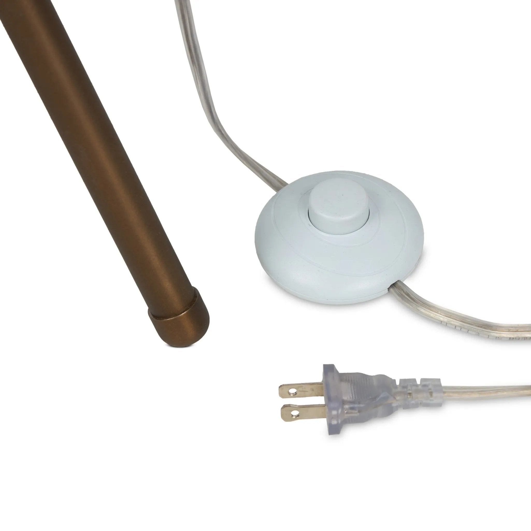 A tripod-base floor lamp, provides light in every direction. Made with slim, sturdy iron in a rubbed bronze finish and topped with linen shades for a soft glow Amethyst Home provides interior design, new home construction design consulting, vintage area rugs, and lighting in the Nashville metro area.