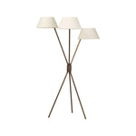 A tripod-base floor lamp, provides light in every direction. Made with slim, sturdy iron in a rubbed bronze finish and topped with linen shades for a soft glow Amethyst Home provides interior design, new home construction design consulting, vintage area rugs, and lighting in the Seattle metro area.