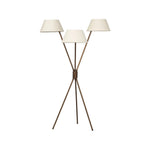 A tripod-base floor lamp, provides light in every direction. Made with slim, sturdy iron in a rubbed bronze finish and topped with linen shades for a soft glow Amethyst Home provides interior design, new home construction design consulting, vintage area rugs, and lighting in the Winter Garden metro area.