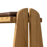 Style this versatile bench just about anywhere. A light, toasted oak frame shapes tapered paddle legs, with relief and split-leg detailing for a design-forward look. A thin layer of brown top-grain leather brings warmth and comfort to the whole look. Amethyst Home provides interior design, new home construction design consulting, vintage area rugs, and lighting in the Des Moines metro area.