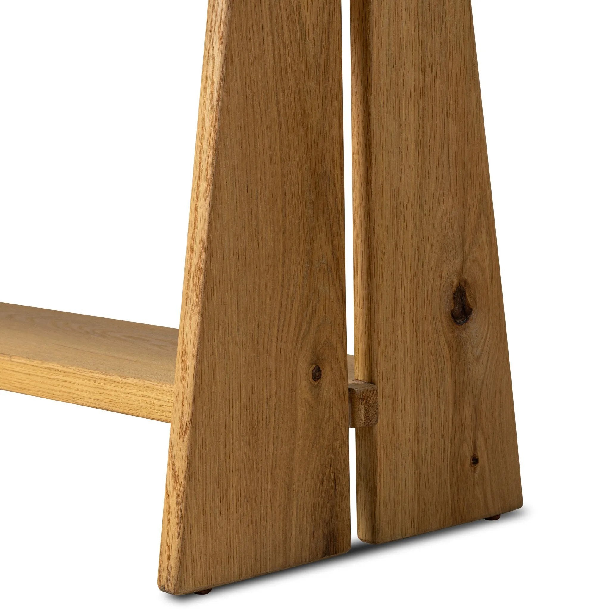 Style this versatile bench just about anywhere. A light, toasted oak frame shapes tapered paddle legs, with relief and split-leg detailing for a design-forward look. A thin layer of brown top-grain leather brings warmth and comfort to the whole look. Amethyst Home provides interior design, new home construction design consulting, vintage area rugs, and lighting in the Park City metro area.