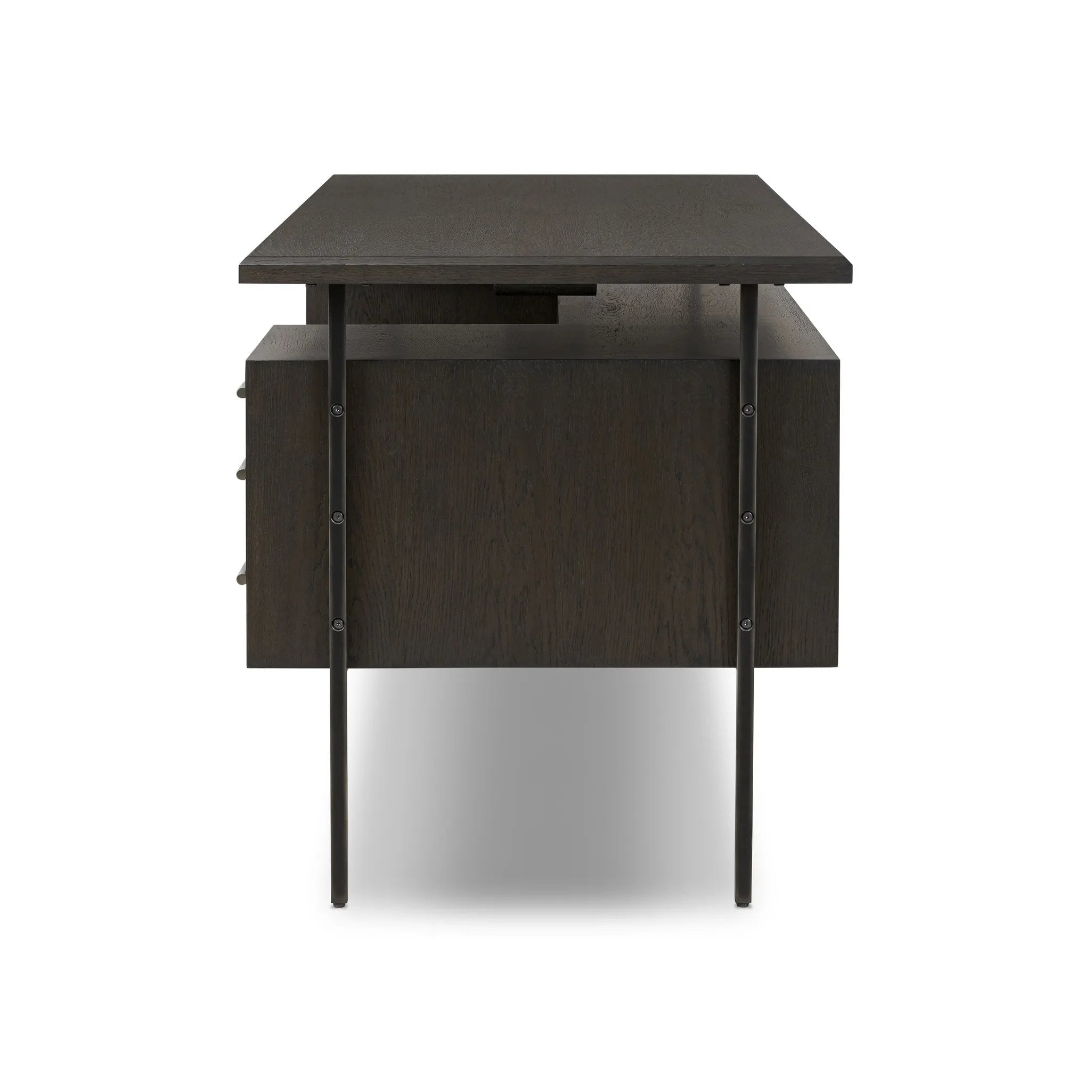 Featuring Lauren Charcoal Oak Resawn Veneer Desk by Four Hands at Amethyst Home. Made from resawn oak and oak veneer, a legal-style desk offers major storage with dual cabinetry, including file storage for legal and letter-size documents. A floating top and iron legs keep the look modern and light. This piece is designed in collaboration with Thomas Bina. . Amethyst Home provides interior design, new home construction design consulting, vintage area rugs, and lighting in the Des Moines metro area.