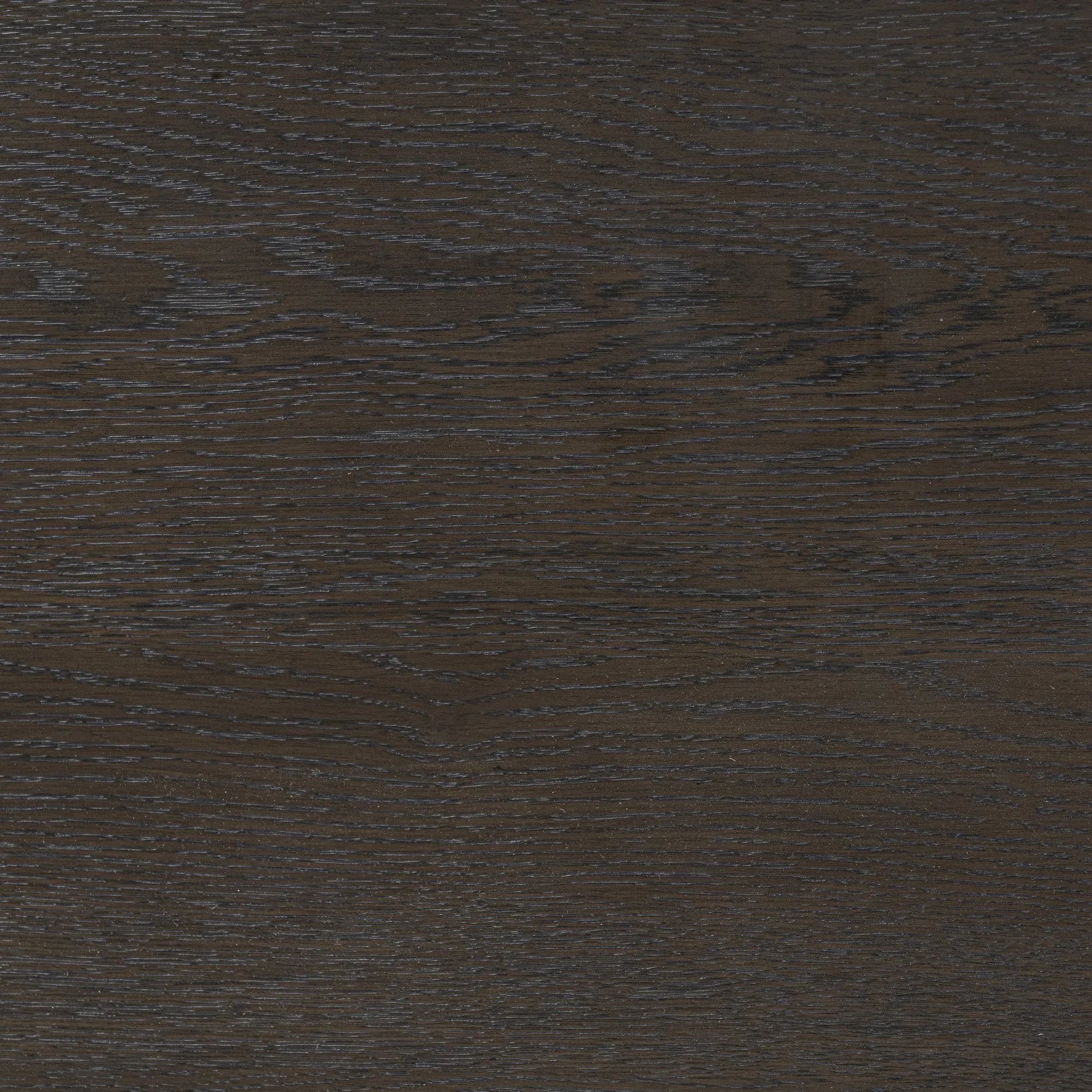 Featuring Lauren Charcoal Oak Resawn Veneer Desk by Four Hands at Amethyst Home. Made from resawn oak and oak veneer, a legal-style desk offers major storage with dual cabinetry, including file storage for legal and letter-size documents. A floating top and iron legs keep the look modern and light. This piece is designed in collaboration with Thomas Bina. Amethyst Home provides interior design, new home construction design consulting, vintage area rugs, and lighting in the Laguna Beach metro area.