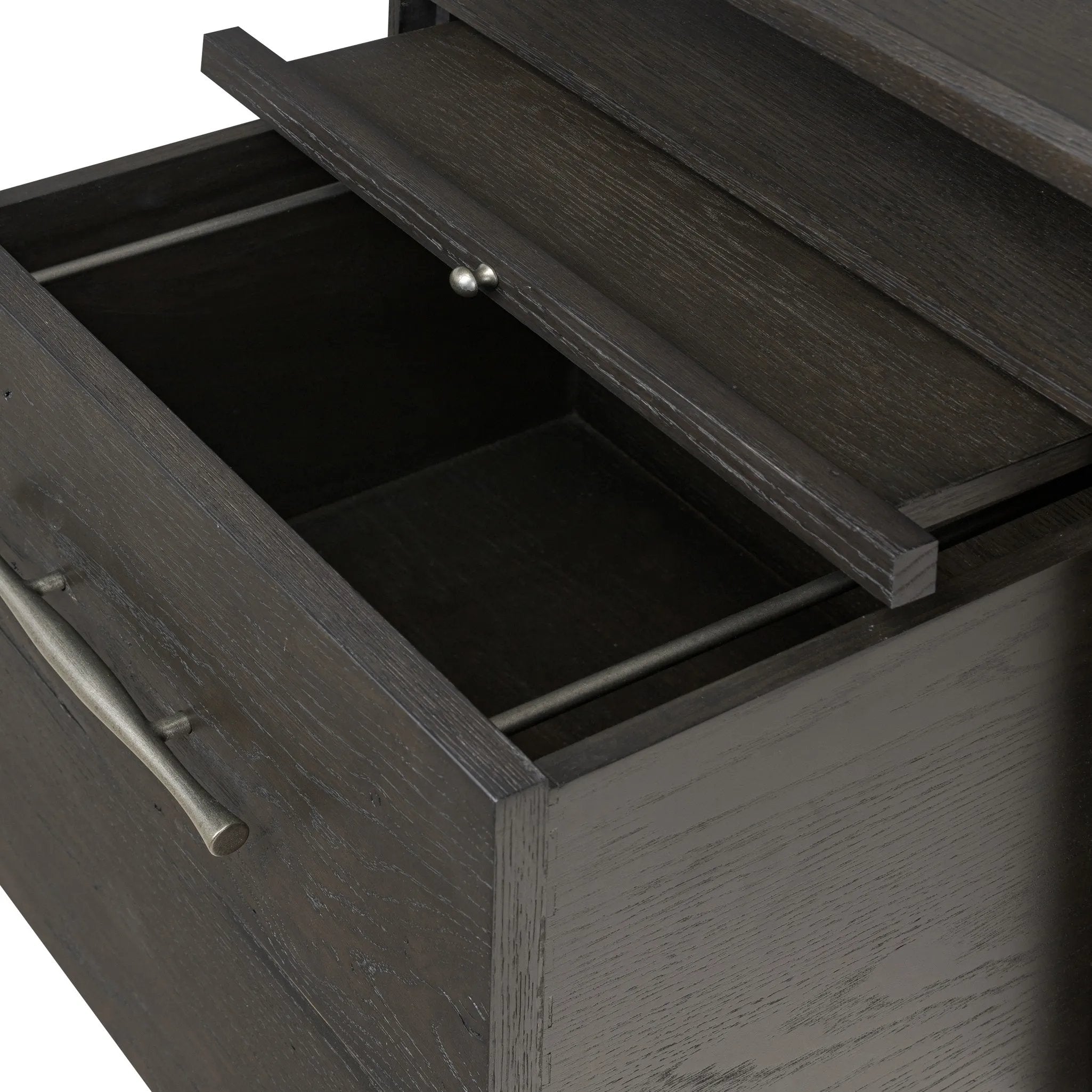 Featuring Lauren Charcoal Oak Resawn Veneer Desk by Four Hands at Amethyst Home. Made from resawn oak and oak veneer, a legal-style desk offers major storage with dual cabinetry, including file storage for legal and letter-size documents. A floating top and iron legs keep the look modern and light. This piece is designed in collaboration with Thomas Bina. F. Amethyst Home provides interior design, new home construction design consulting, vintage area rugs, and lighting in the Nashville metro area.