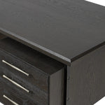 Featuring Lauren Charcoal Oak Resawn Veneer Desk by Four Hands at Amethyst Home. Made from resawn oak and oak veneer, a legal-style desk offers major storage with dual cabinetry, including file storage for legal and letter-size documents. A floating top and iron legs keep the look modern and light. This piece is designed in collaboration with Thomas Bina. . Amethyst Home provides interior design, new home construction design consulting, vintage area rugs, and lighting in the Washington metro area.